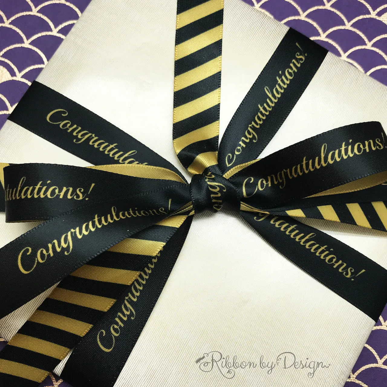 Black and gold stripe ribbon printed on 5/8" dijon gold