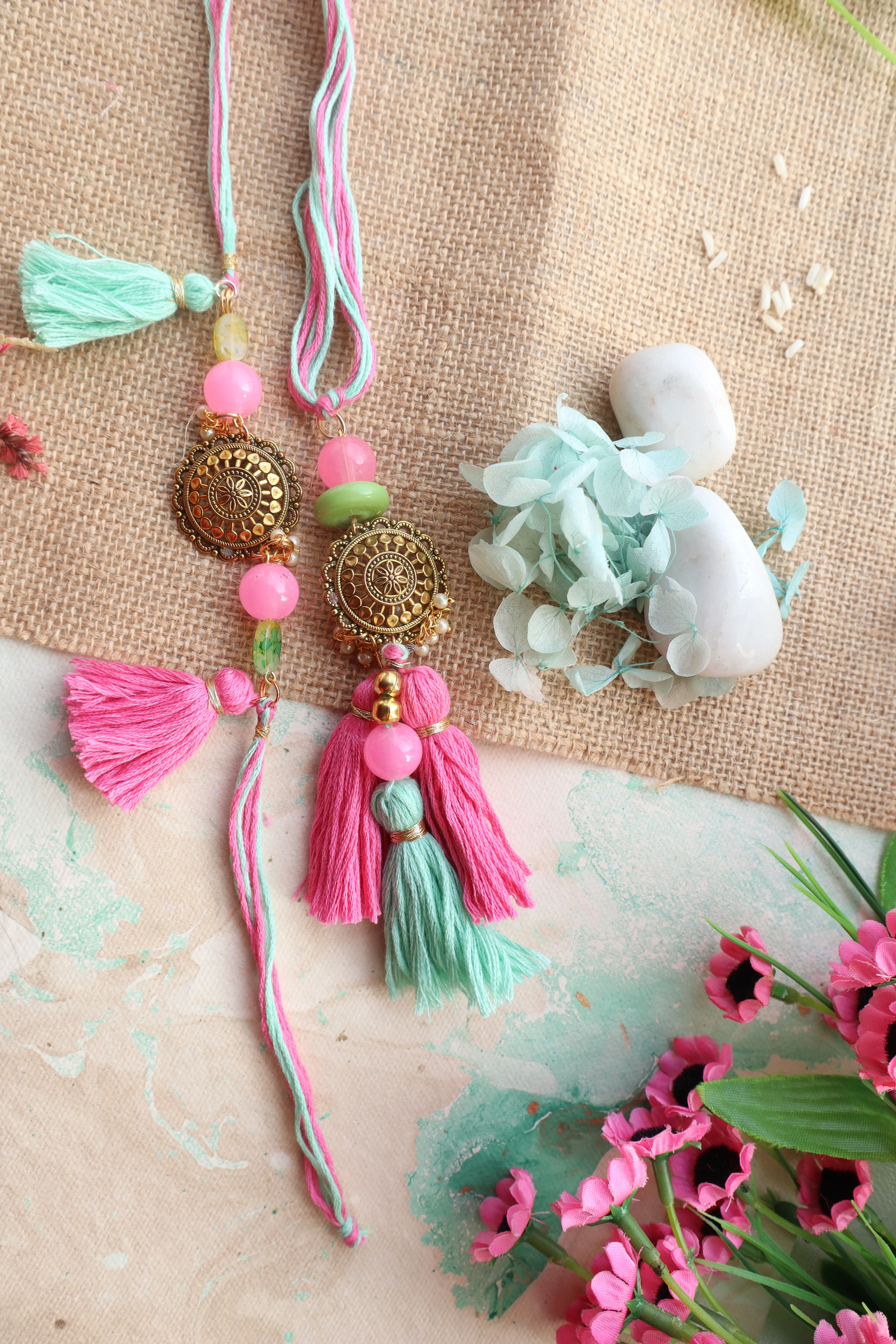 Kamule Oxidized Pendant Embellished Tassel Bhaiya Bhabhi Rakhi Set - Pink and Green