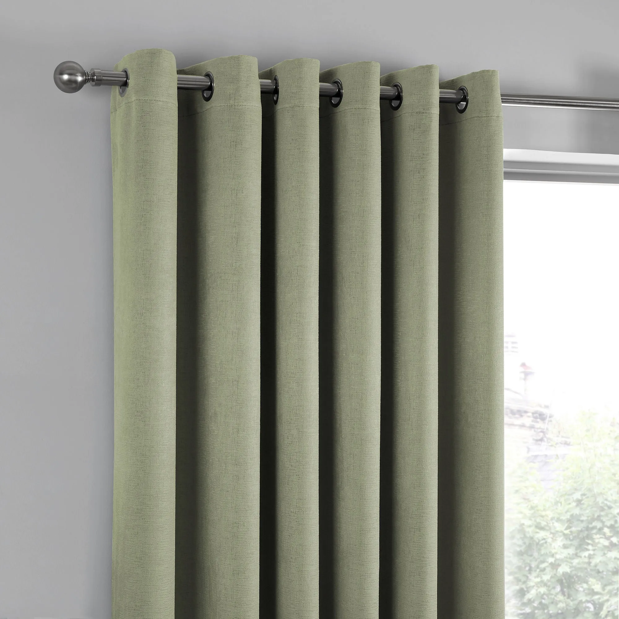 Strata Pair of Eyelet Curtains by Fusion in Green
